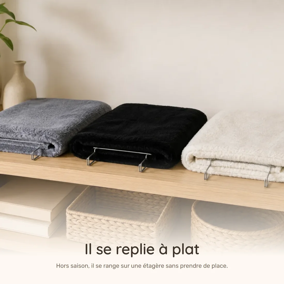 It folds flat — the three radiator hammocks folded side by side on a wooden shelf